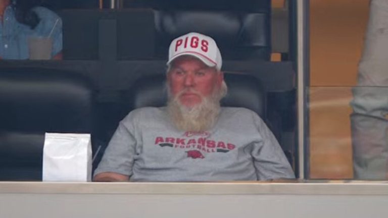 John Daly Watches Arkansas Reduction From Jerry Jones’ Box In Magnificent Hat – uBetMobile.com