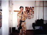 Photographs emerge of David Carrick posing with rifle in entrance of collage of bare girls as teen in Military