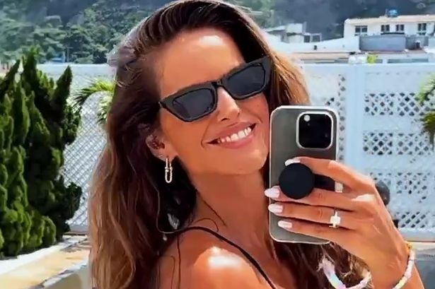 Intercourse-mad football WAG wows in barely-there bikini as she gears up for carnival in Brazil | News and Gossip